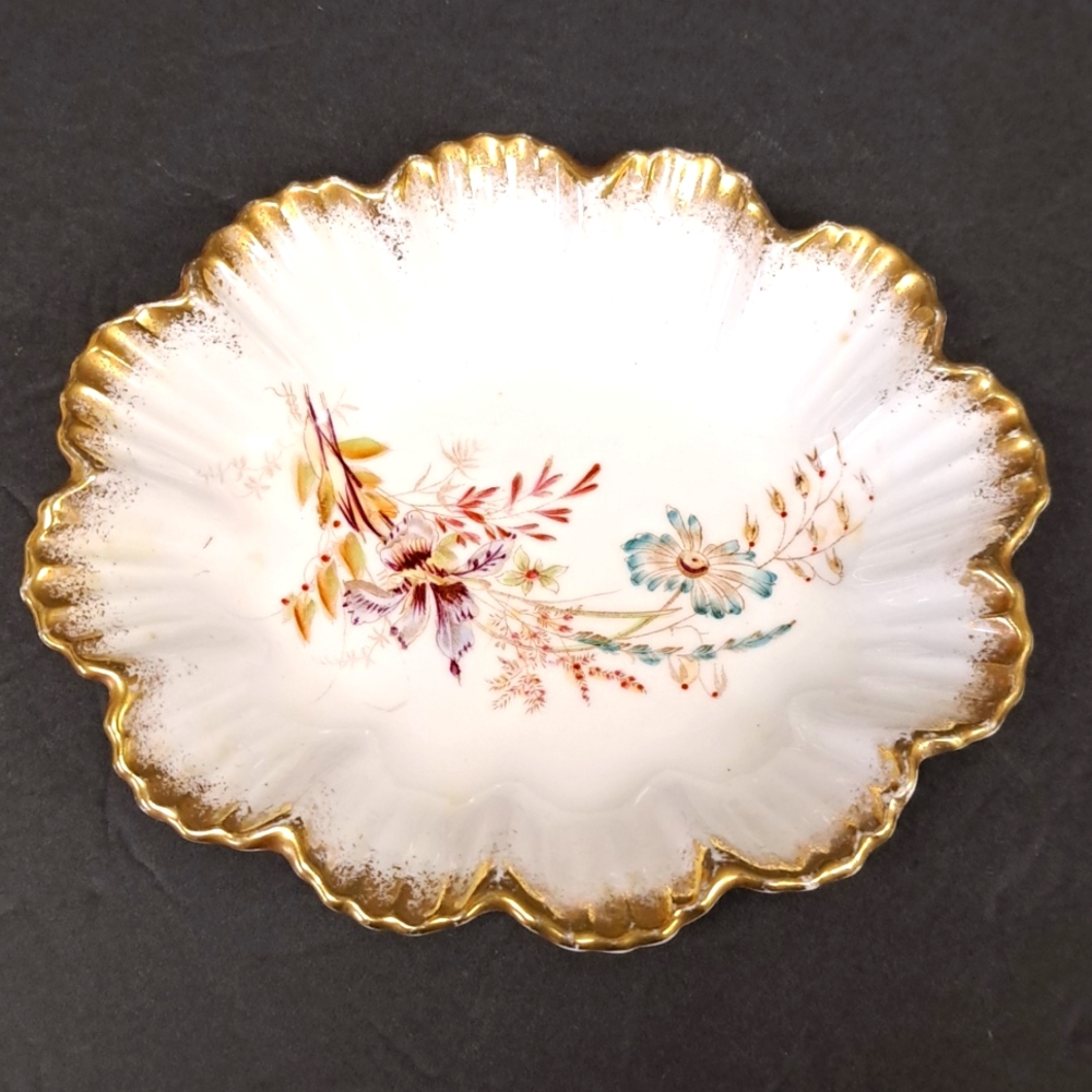 Vintage bone china trinket dish with ruffled edge and gold trim